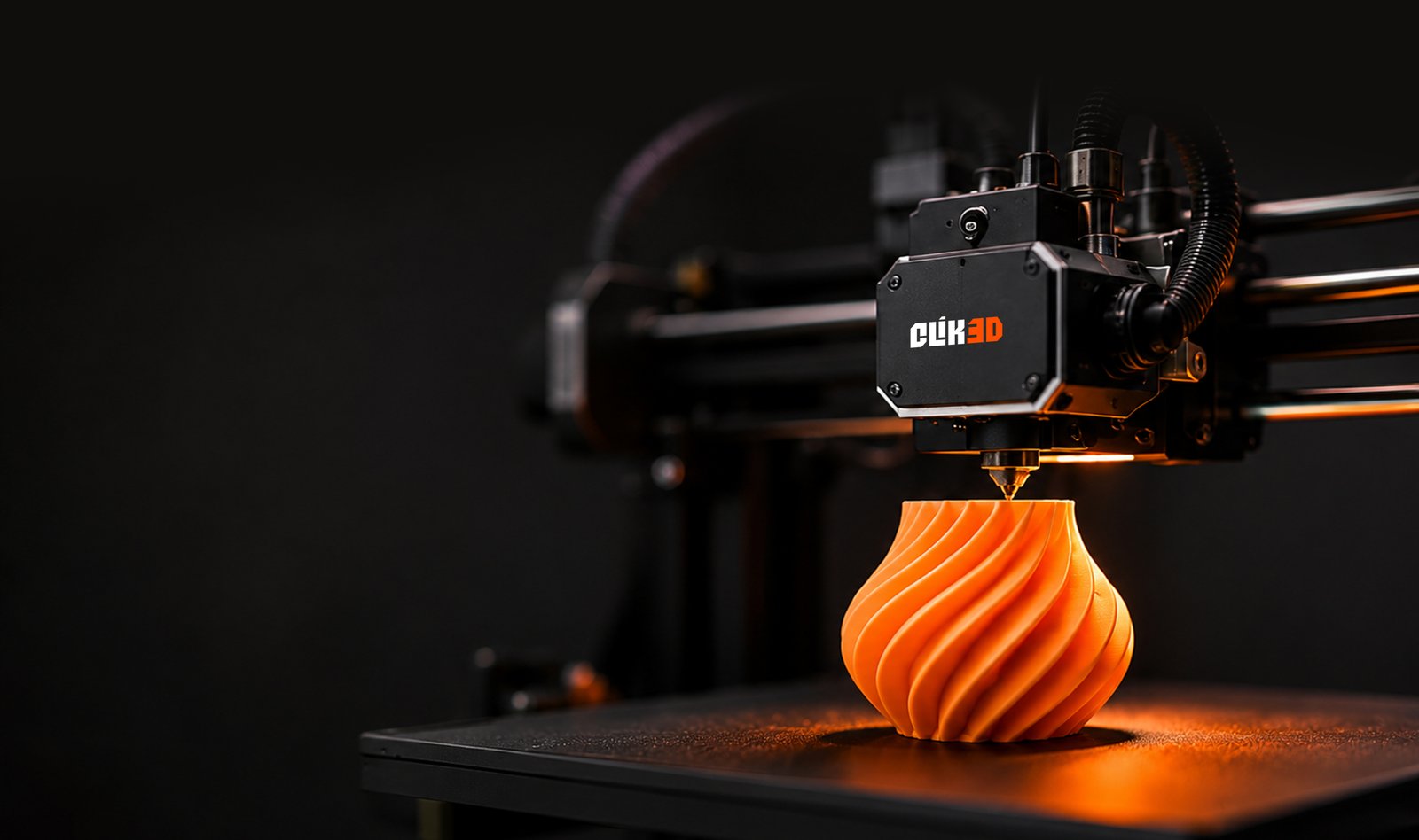 3D printer making an orange vase